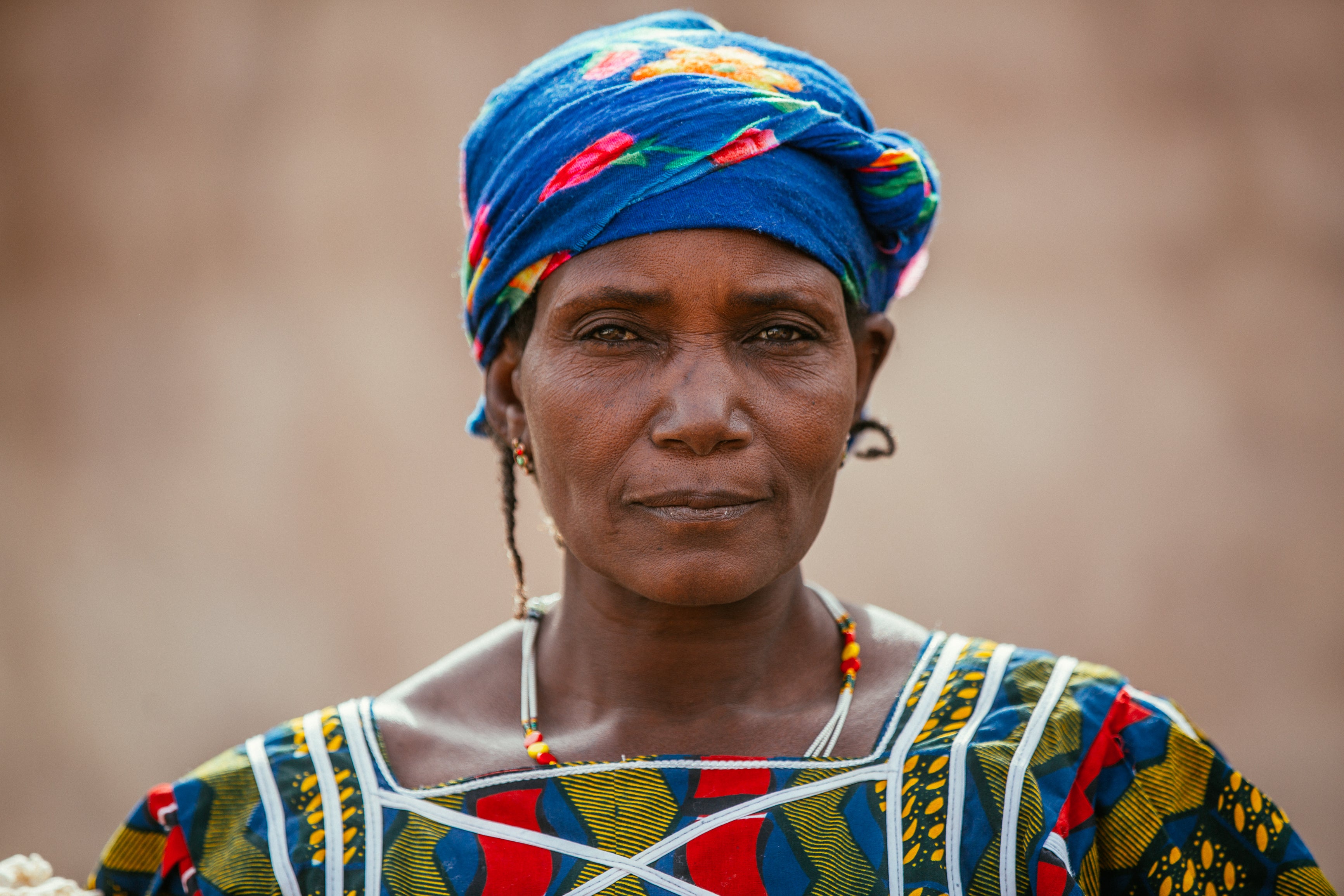 Boubacar Doumbia of Le Ndomo hand dyeing indigo pieces